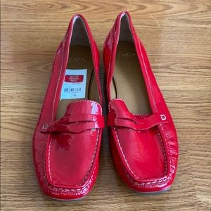 Women’s flat red patent leather shoes